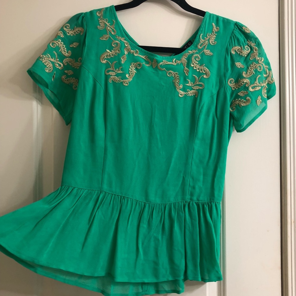 NWT  peplum style blouse with gold embroidery